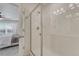 Tiled shower with glass enclosure showcasing a modern shower head and clean design at 17548 Bluetrail Ave, Parker, CO 80134