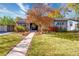 Attractive house exterior with landscaping and walkway at 5123 Bryant St, Denver, CO 80221