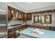 Kitchen boasting wooden cabinets, stainless steel appliances, and a center island at 5361 Nassau Cir, Cherry Hills Village, CO 80113
