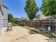 Spacious fenced backyard with patio area at 1956 Cathay St, Aurora, CO 80011