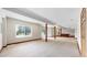 Spacious finished basement with beams, an egress window, and space for recreation at 7641 Kelty Trl, Franktown, CO 80116