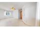 This bedroom has neutral carpet, a ceiling fan, and a window for natural light at 7641 Kelty Trl, Franktown, CO 80116