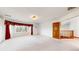 Bedroom with a large bay window and a door to the stairs at 7641 Kelty Trl, Franktown, CO 80116