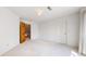 Bedroom with a door to another room at 7641 Kelty Trl, Franktown, CO 80116