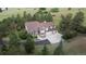 Beautiful home featuring a two car garage surrounded by lush greenery at 7641 Kelty Trl, Franktown, CO 80116