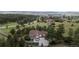Scenic view of a two story home surrounded by trees and a vast landscape at 7641 Kelty Trl, Franktown, CO 80116