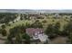 Scenic view of a two story home surrounded by trees and a vast landscape at 7641 Kelty Trl, Franktown, CO 80116