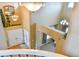 Elegant foyer with a chandelier, a view of the front door, and an archway that leads into the living space at 1168 Coneflower Way, Brighton, CO 80601