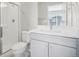 Modern bathroom with shower, toilet and vanity at 21021 E 63Rd Dr, Aurora, CO 80019