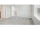 Spacious bedroom with neutral gray carpeting and window at 21021 E 63Rd Dr, Aurora, CO 80019