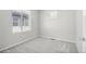 Well-lit bedroom with carpet flooring and window at 21021 E 63Rd Dr, Aurora, CO 80019