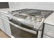 Stainless steel kitchen appliances, including a gas range, oven, microwave, and refrigerator at 21021 E 63Rd Dr, Aurora, CO 80019