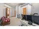 Home office features a desk, computer, and comfortable seating at 30174 Glen Eyrie Dr, Evergreen, CO 80439