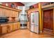Updated kitchen with stainless steel appliances and ample cabinet space at 30174 Glen Eyrie Dr, Evergreen, CO 80439