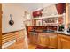 Kitchen features stainless steel dishwasher and wood cabinets at 30174 Glen Eyrie Dr, Evergreen, CO 80439