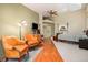 Main bedroom with king-size bed and leather armchairs at 30174 Glen Eyrie Dr, Evergreen, CO 80439