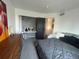 Bedroom with a desk area, and grey comforter at 4824 S Eaton Park Way, Aurora, CO 80016