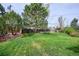 Backyard with lawn and mature trees at 6587 S Clarkson St, Centennial, CO 80121
