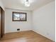 Bedroom with hardwood floors, window and closet at 6587 S Clarkson St, Centennial, CO 80121