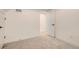 A basic basement bedroom featuring neutral carpet and white doors and trim at 1101 S Dahlia St, Denver, CO 80246