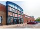 World Market store exterior featuring large windows, brick facade, and customer parking at 1101 S Dahlia St, Denver, CO 80246