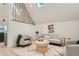 Bright living room with vaulted ceilings, stylish decor, and comfortable seating at 1101 S Dahlia St, Denver, CO 80246