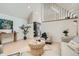 Modern living room featuring stylish decor, hardwood floors, and comfortable seating arrangements at 1101 S Dahlia St, Denver, CO 80246
