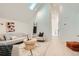 Bright living room with vaulted ceilings, stylish furnishings, and modern decor at 1101 S Dahlia St, Denver, CO 80246