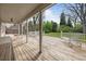 Expansive backyard wooden deck perfect for outdoor seating, with chairs and backyard views at 3821 S Magnolia Way, Denver, CO 80237