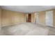 Large Primary bedroom featuring a walk-in closet, attached bath and neutral carpeting at 3821 S Magnolia Way, Denver, CO 80237