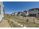 View of neighboring homes including fenced backyards at 18049 E 106Th Ave, Commerce City, CO 80022