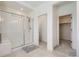 Bathroom with a large shower with glass door at 18049 E 106Th Ave, Commerce City, CO 80022