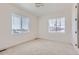 Bright bedroom with carpet and window at 18049 E 106Th Ave, Commerce City, CO 80022