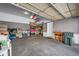 Spacious garage with ample storage and overhead door, providing secure parking and organization at 9374 Loggia St # D, Highlands Ranch, CO 80126