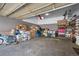 Organized garage space with storage racks, boxes, and bicycles at 9374 Loggia St # D, Highlands Ranch, CO 80126