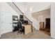 Staircase landing converted to office space with computer and desk at 9374 Loggia St # D, Highlands Ranch, CO 80126