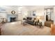 Finished basement with a fireplace, comfortable seating, and neutral carpeting at 1470 Utica St, Denver, CO 80204
