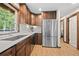 Well-equipped kitchen featuring stainless steel appliances, granite countertops, and ample storage space at 375 Castlewood Dr, Evergreen, CO 80439
