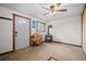 Cozy living room features a wood-burning stove, wood accents, and natural light at 375 Castlewood Dr, Evergreen, CO 80439