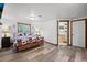 Main bedroom featuring an ensuite bathroom and forest themed decor at 375 Castlewood Dr, Evergreen, CO 80439