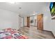 Spacious main bedroom featuring wooden closet doors and hardwood flooring at 375 Castlewood Dr, Evergreen, CO 80439