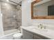 Modern bathroom with updated vanity and tile at 6954 Granite Crag Cir, Evergreen, CO 80439