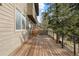 Wooden deck with mountainside views at 6954 Granite Crag Cir, Evergreen, CO 80439