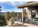 Spacious deck with mountain views and seating area at 6954 Granite Crag Cir, Evergreen, CO 80439