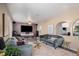 Cozy living room features hardwood floors, recessed lighting, and comfortable seating at 4570 S Kalispell Way, Aurora, CO 80015