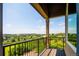 Balcony with stunning views of lush green trees and open sky in a suburban landscape at 4320 Stone Post Dr, Castle Rock, CO 80108