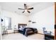 Comfortable bedroom with large windows, a ceiling fan, and wood floors at 4320 Stone Post Dr, Castle Rock, CO 80108