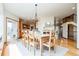 Open dining area with natural light, hardwood floors, and easy access to the kitchen at 4320 Stone Post Dr, Castle Rock, CO 80108