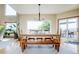Inviting dining area featuring wooden furniture and a sliding glass door to the outdoor patio at 4320 Stone Post Dr, Castle Rock, CO 80108