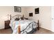 Bedroom featuring neutral walls, carpet flooring, and decor art at 4917 S Xenophon Way, Morrison, CO 80465